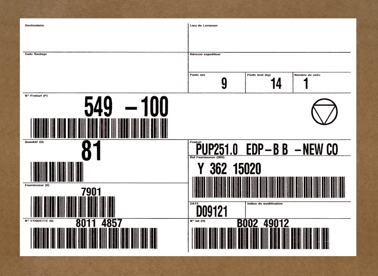 Close-up photo of a logistics label fixed to a carton, illustrating how shipping marks help identify cargo in handling.